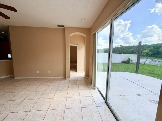 entrance to in law area off family room with separate exterior door and full bathroom