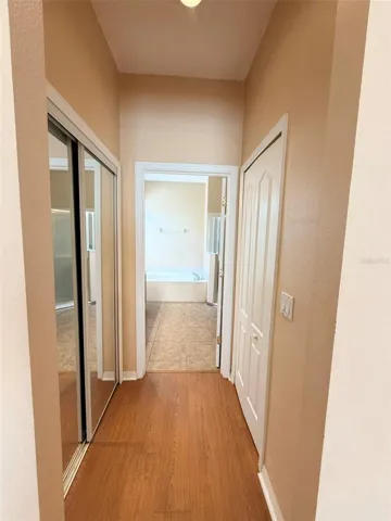 Primary bath entrance with two Closets