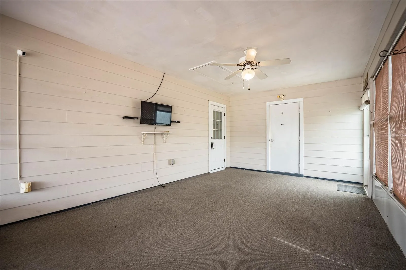 Former carport, now screen porch