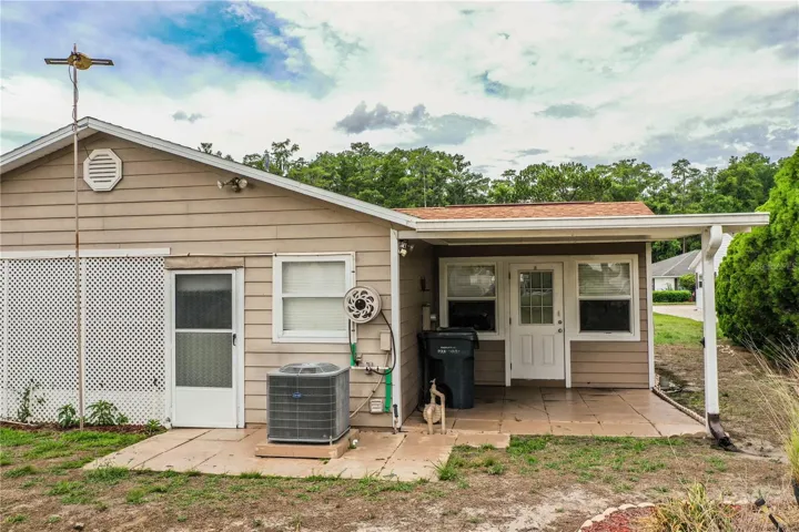 side of house showing small porch