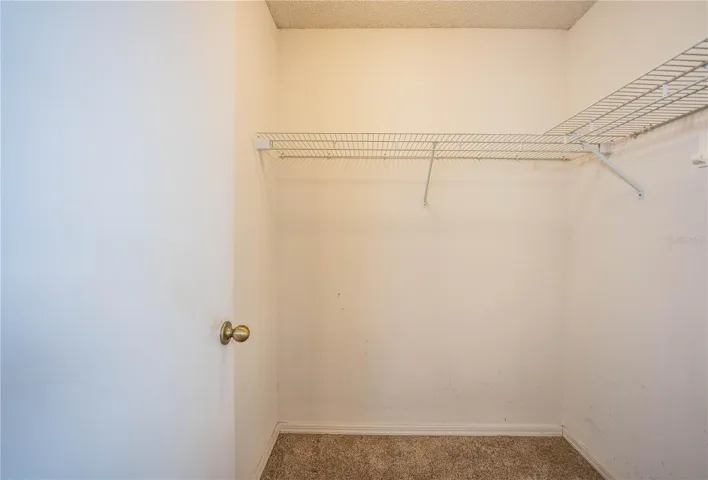 Walk in Primary bedroom closet