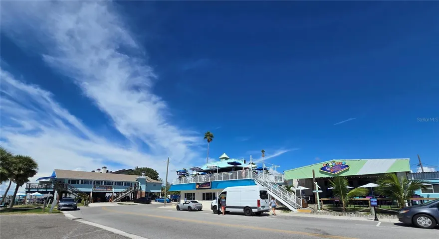 Two blocks over from Sunset Park are The Toasted Monkey and Buoy's, both great for food, music and amazing views.