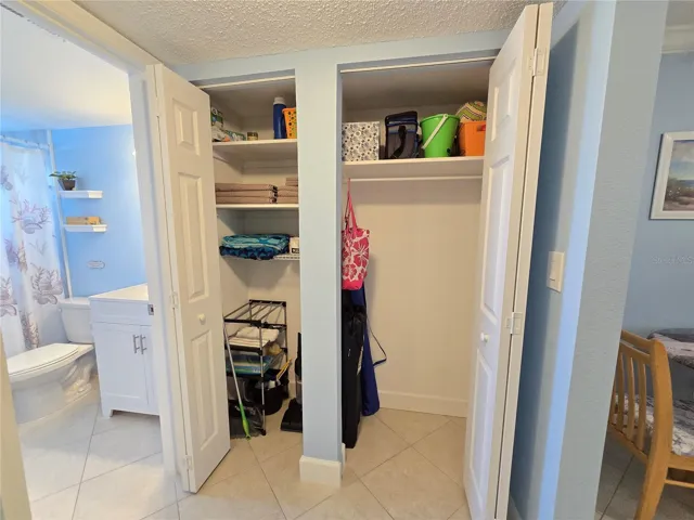 All linens and beach items convey.