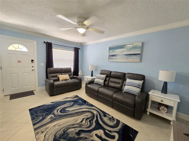 Luxury leather loveseat and reclining sofa are the prefect place to relax after a day at the beach.