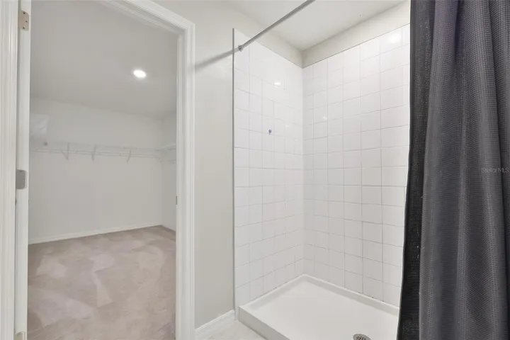 Primary Shower looking into the Primary Closet