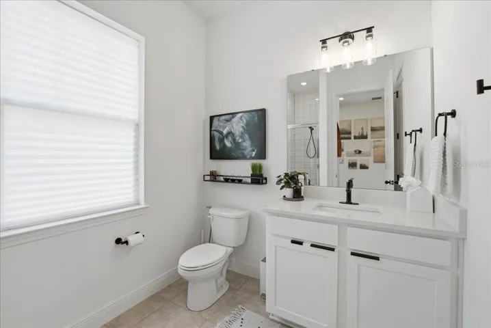 FULL bath with deep shower enclosure and storage closet