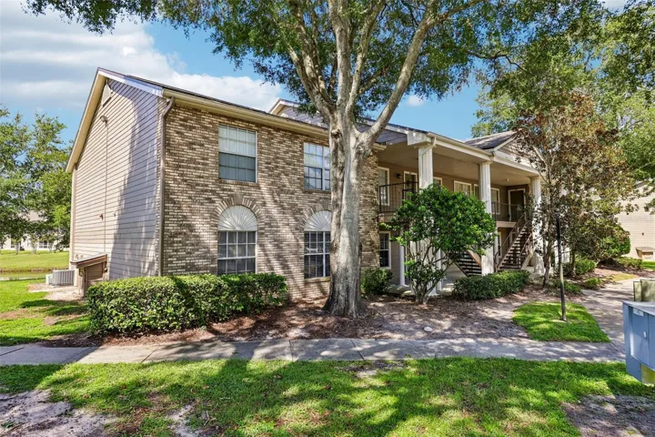 Enjoy easy FIRST FLOOR LIVING, a peaceful POND VIEW and a private CORNER UNIT setting in Hunters Reserve!