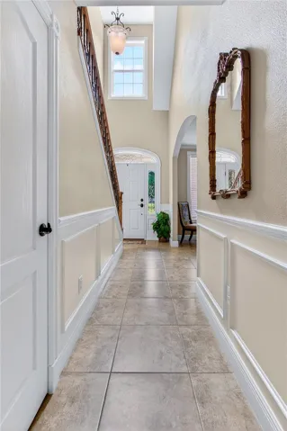 custom detail is everywhere; note the under the stairs closet for storage