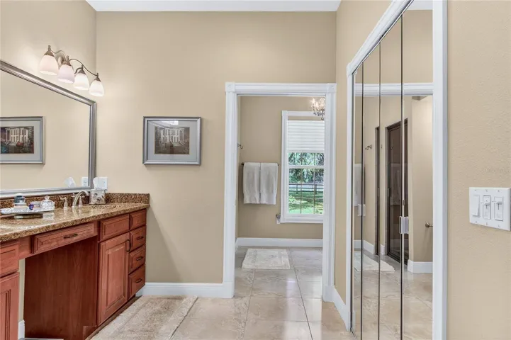 large closet to the right & straight ahead to shower & separate tub