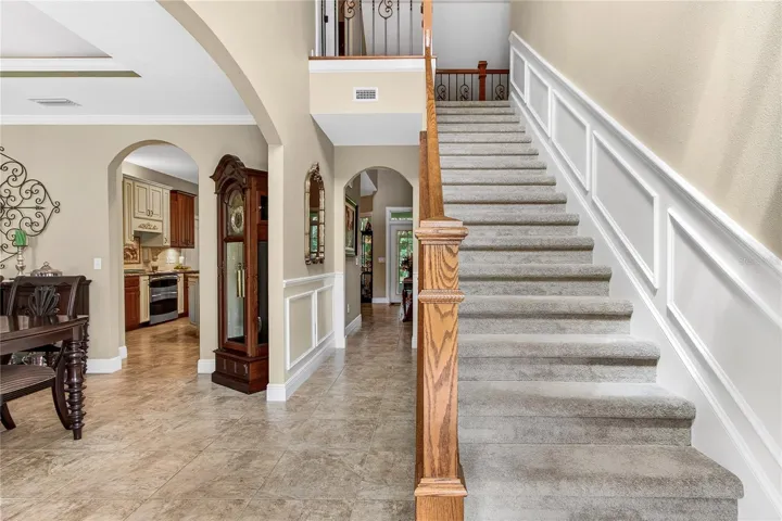 kitchen to the left thru dining & straight thru hall to family room