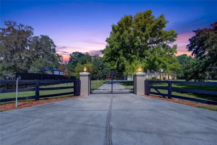 electric, remote controlled gate with power & water access