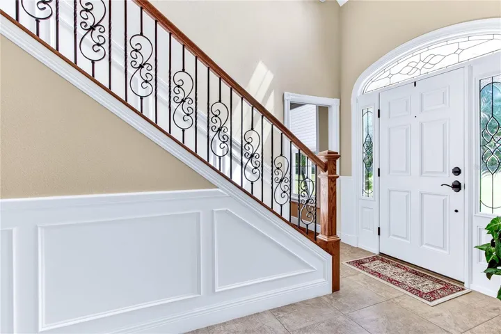enter front door, to the right is the 4th bedroom
