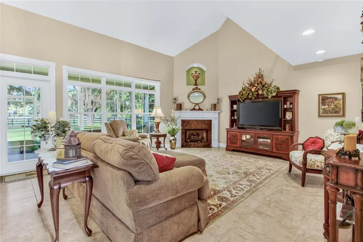 living room, downstairs family with french door going out back & lots of windows