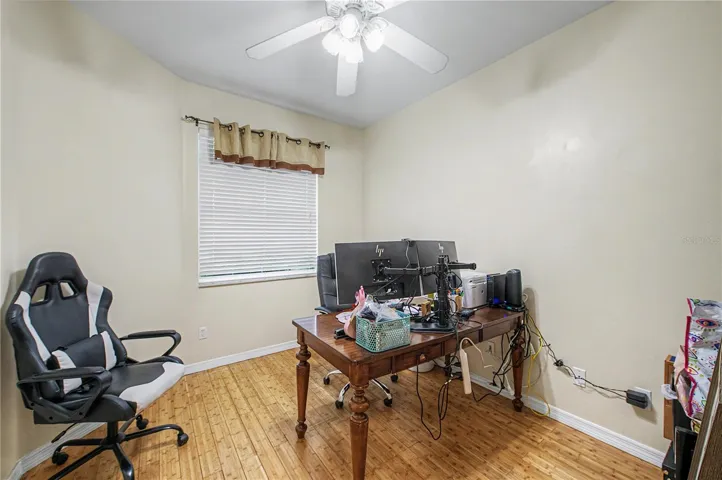 Office with Bamboo Flooring, ceiling fan (no closet- would need an armoire). or 5th Bedroom