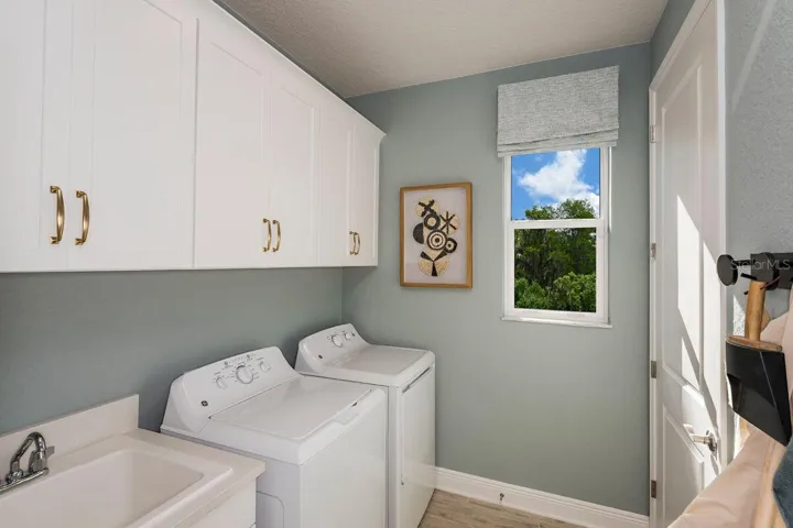 Laundry-Photo description represents the model home of same floor plan.