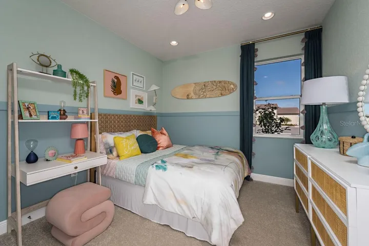 Bedroom 2-Photo description represents the model home of same floor plan.