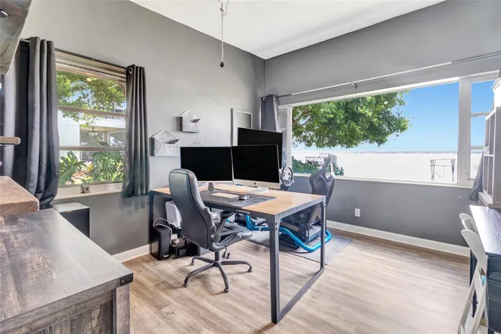 Bedroom two being used as an office with lake view