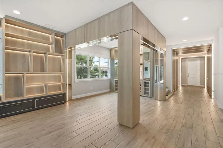Custom built-ins throughout home with elegant lighting