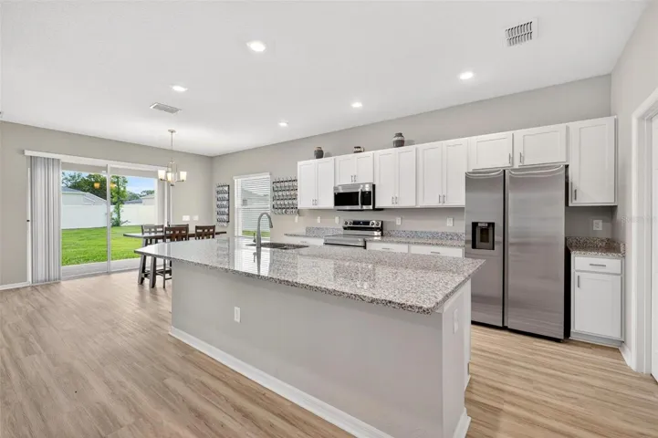 Kitchen featuring granite countertops and stainless steel appliances