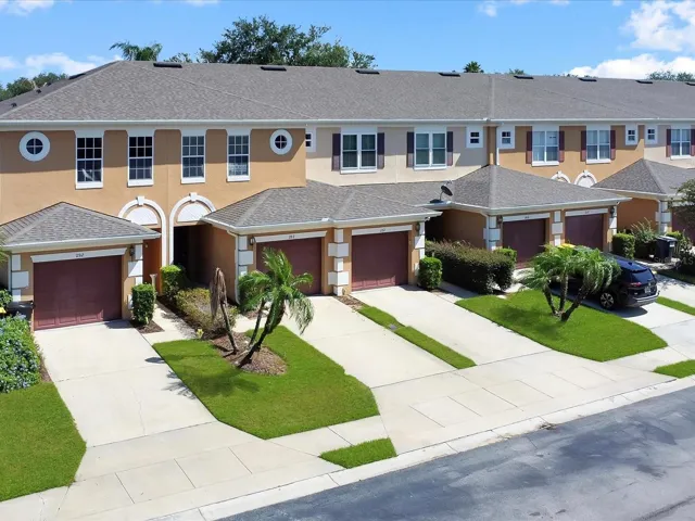 Exterior photo showing the Front of the House and the Houses right next to it