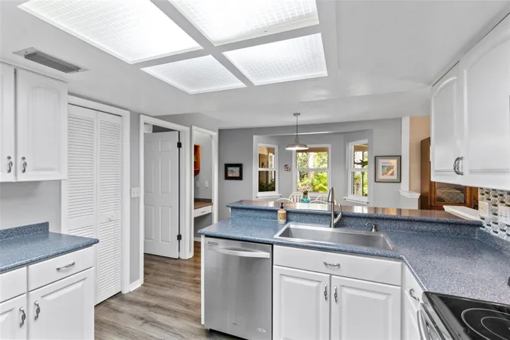 Easy access from the kitchen to dining, family room and pool too