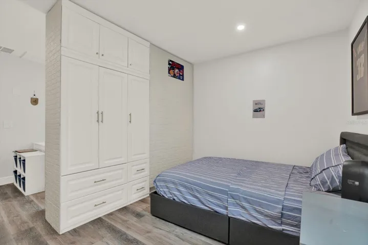 3rd bedroom storage closet system can be moved back to a wall for one large bedroom