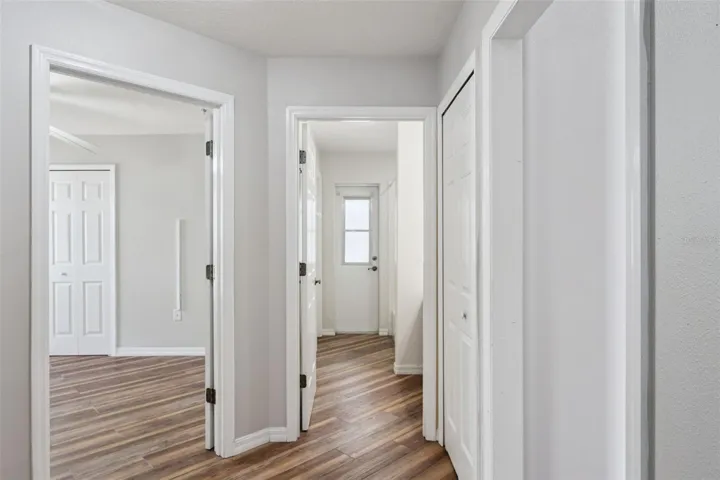 Hallway leading to Pool Bathroom.