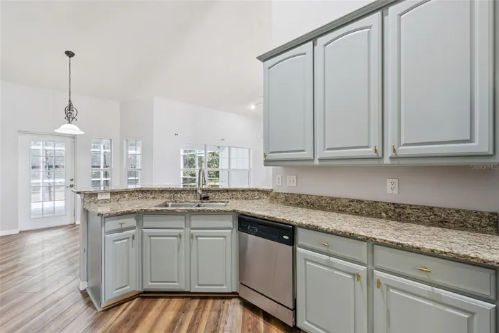 Kitchen with Granite Counters and Snack Bar.