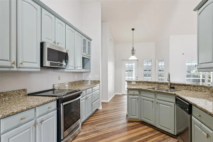 Kitchen - 10.10 X 28.1 - Granite Counters and Stainless Steel Appliances.