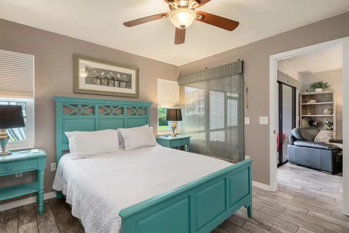 Canal front primary bedroom with adjustable bed.