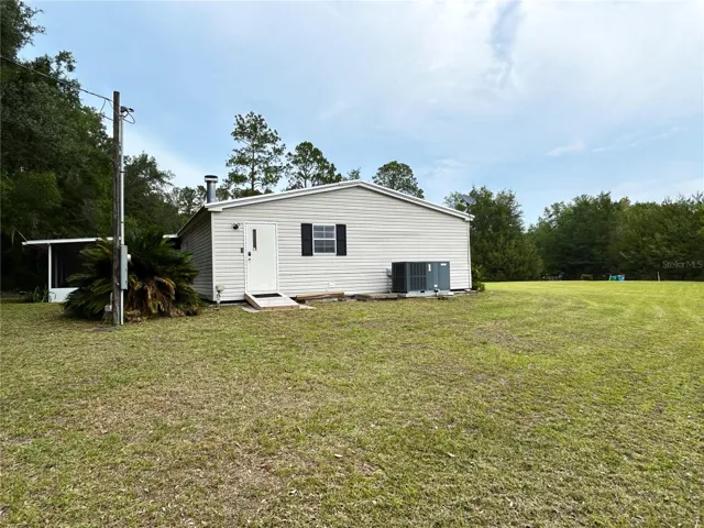 South side of home and crawl space access