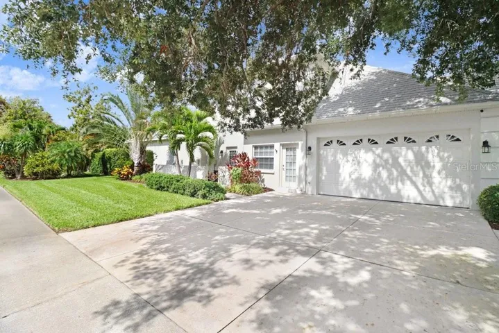 Facade:East Side of Corner Lot; Side Entrance & Office Entrance &2 Car Garage
