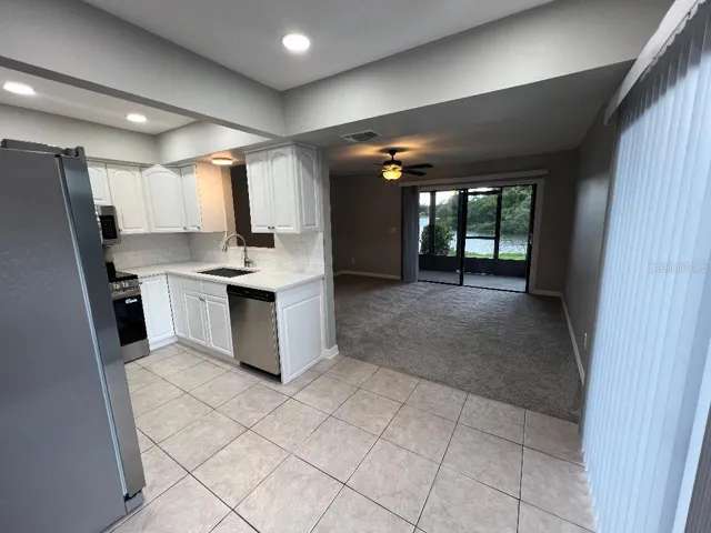 Kitchen, dining and family room all with water views!