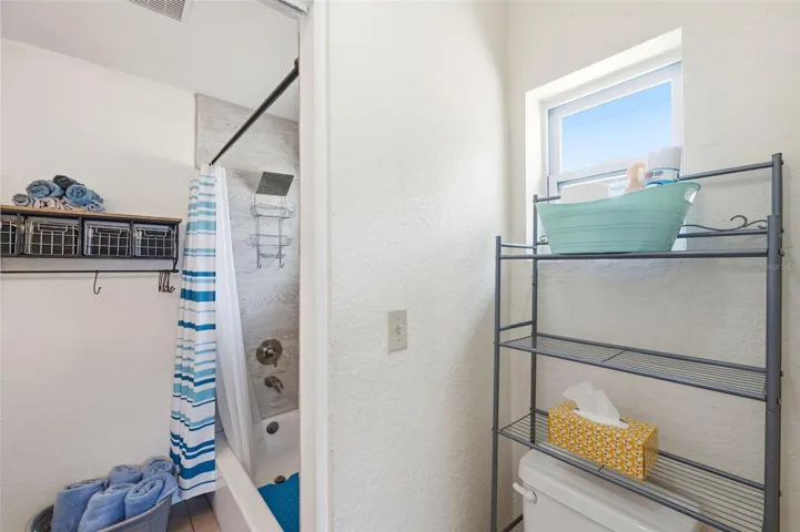 Bathroom off the Primary Bedroom with access from the hall as well.