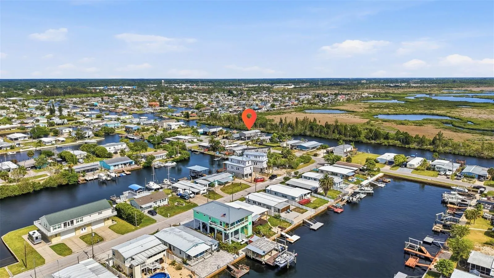 Just look at all the gorgeous homes now up on stilts and many more coming!!  This home is already done so you had best come and get it before its gone!