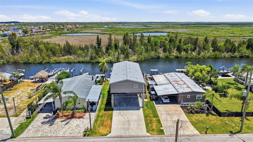 Wide and deep canals, only minutes to the Gulf with this nature preserve as your perfect neighbor!!