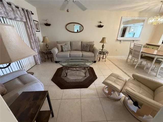 Living Room/Dining Room with Tile Flooring, Sliders to the Lanai