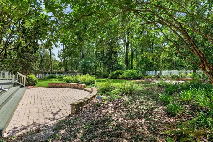 COURTYARD OVERLOOKS LUSH YARD