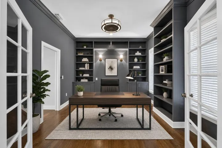 STAGED STUDY TO THE RIGHT OF THE FOYER