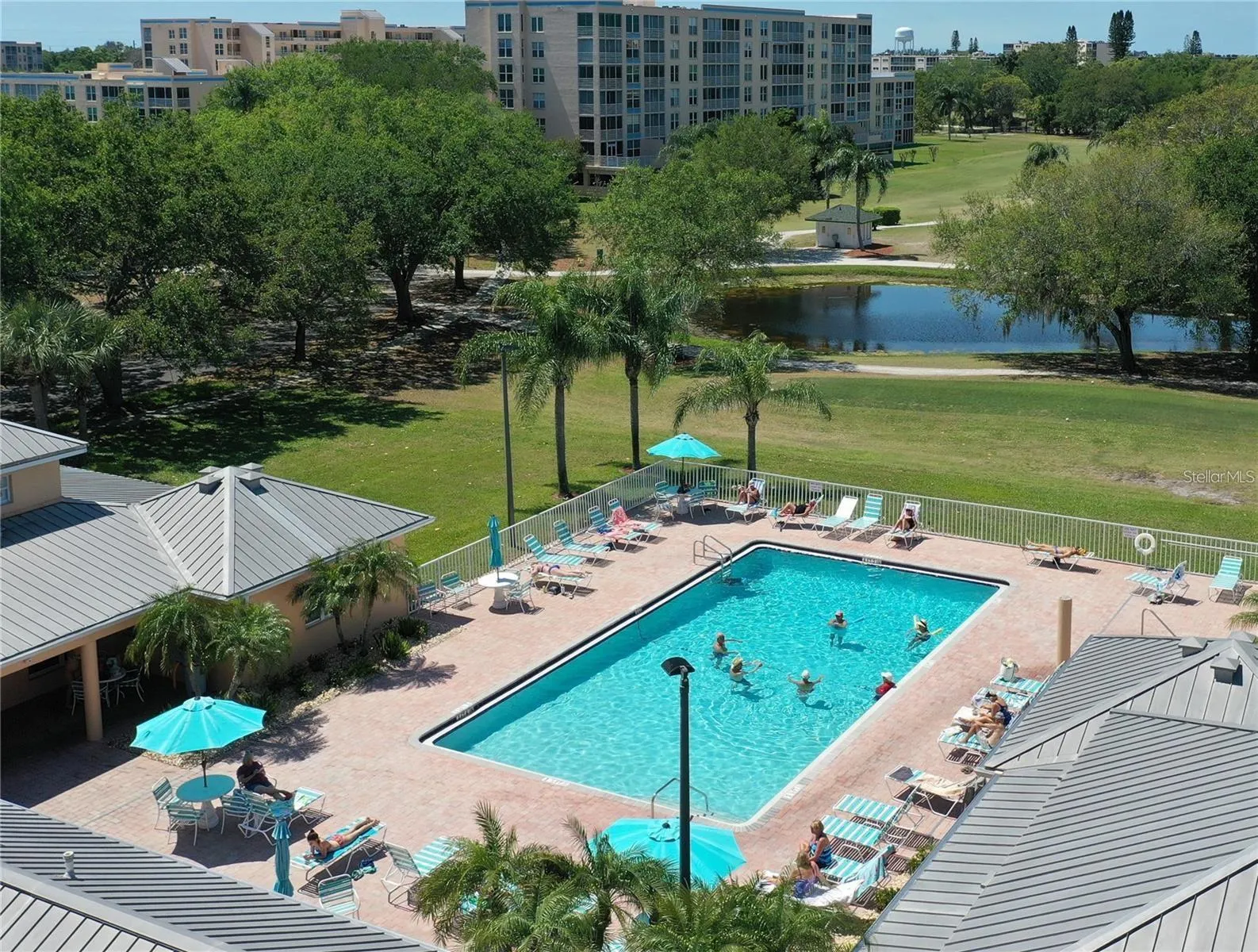 Clubhouse pool, hot tub, outdoor shower, water aerobics, grills