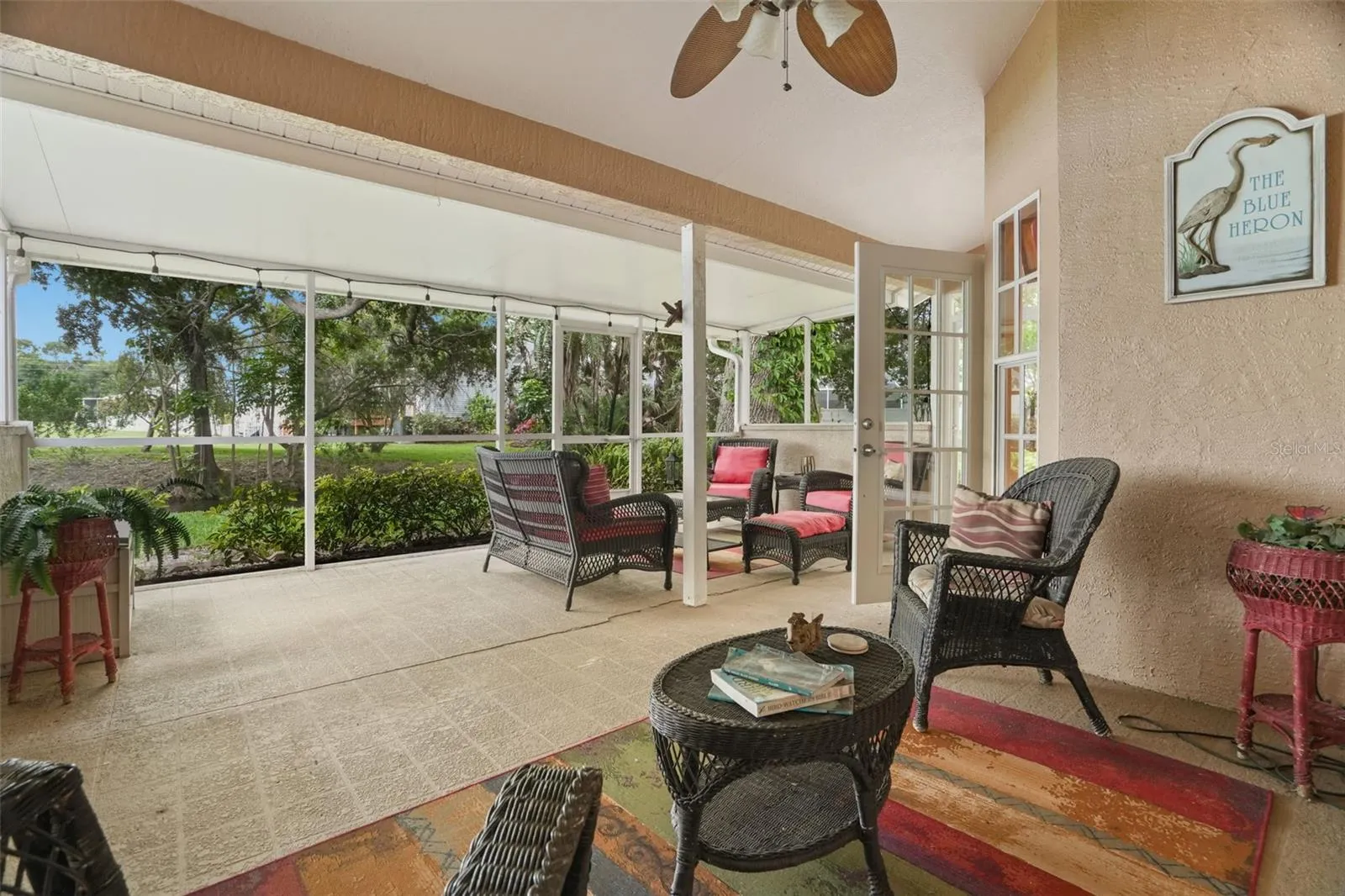 Large lanai with covered area and lake views
