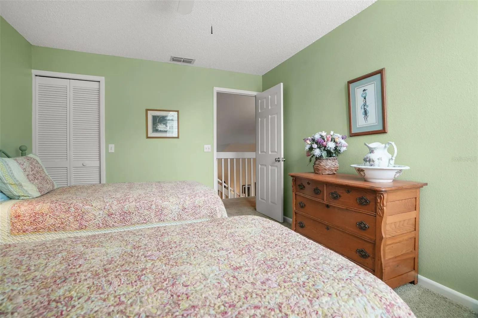 3rd bedroom upstairs with walk in closet