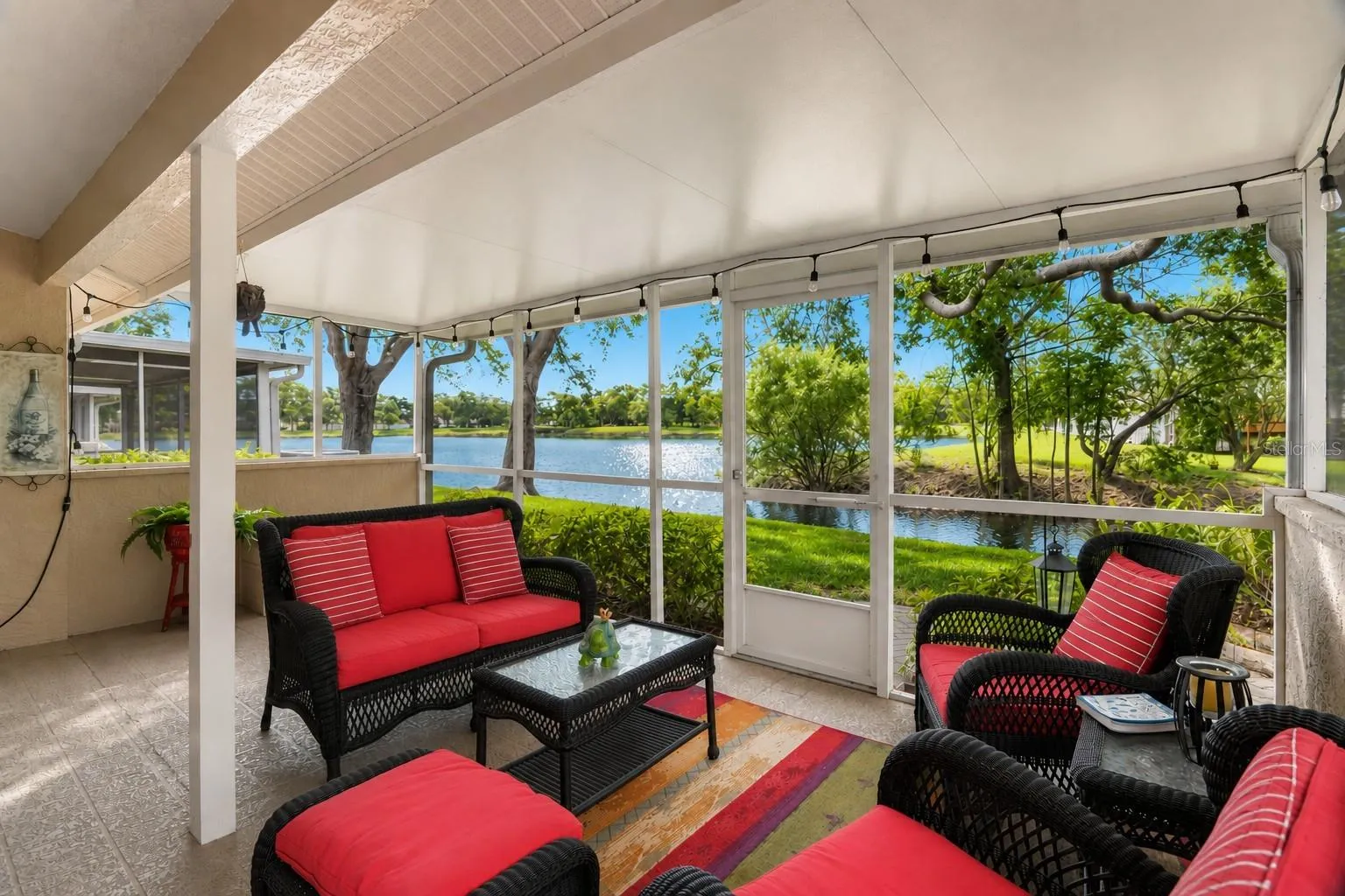 Oversized screened in lanai with lake views