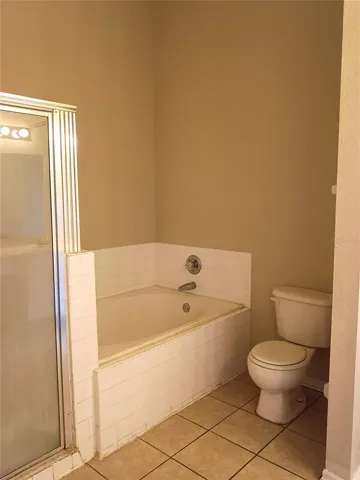 Primary Bathroom - Shower-Tub-Commode