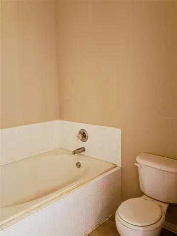 Primary Bathroom - Tub and Commode