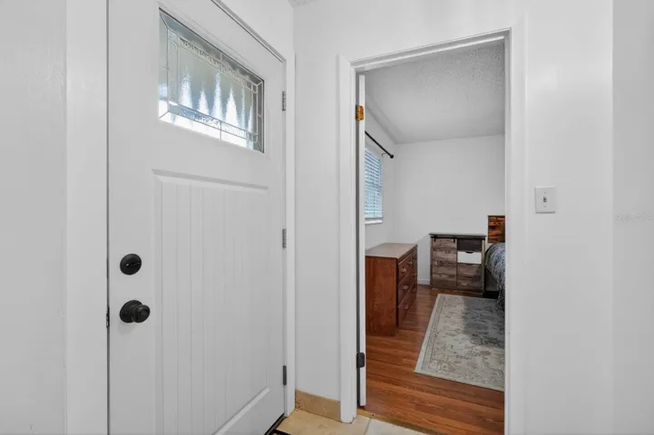 Front entryway with entrance to master