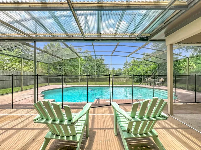 Relax and enjoy the screened pool!