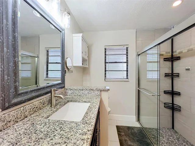 Owner's en-suite with views of the remodeled shower.