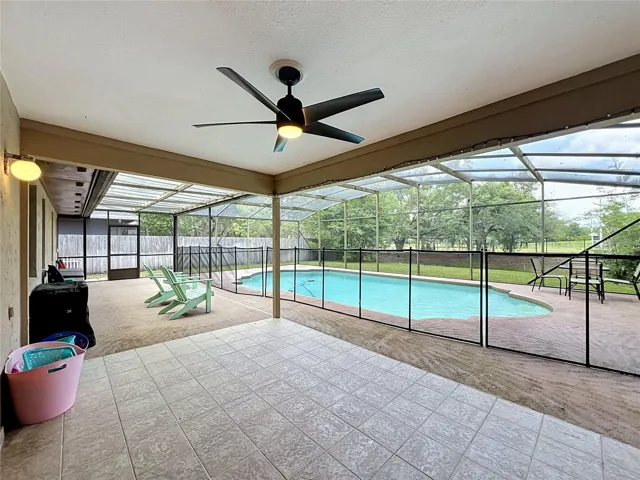 Lanai with covered space which is the entire length of the house.