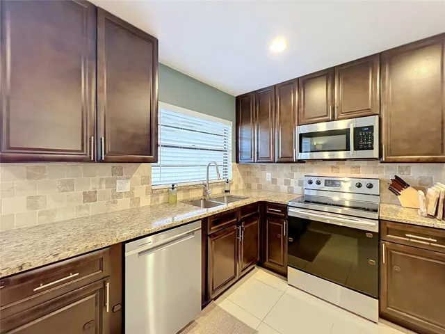 Newer dishwasher.  Enjoy the natural light in the kitchen with the windows above the sink.
